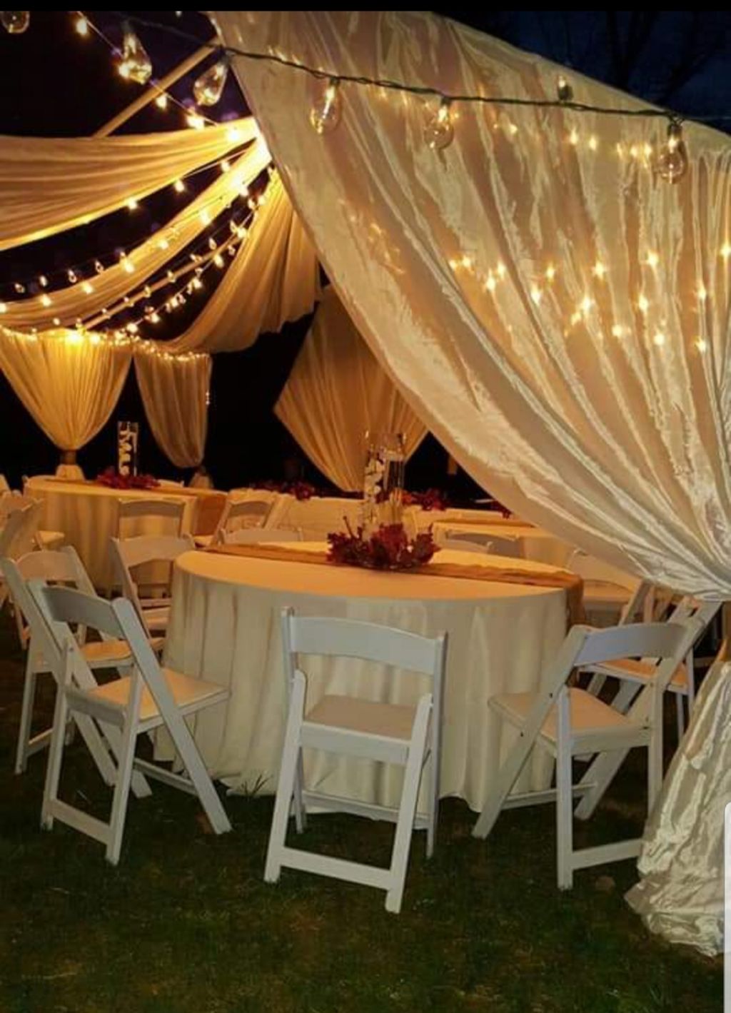 Ceiling drapping tents. Resin chairs. Decor