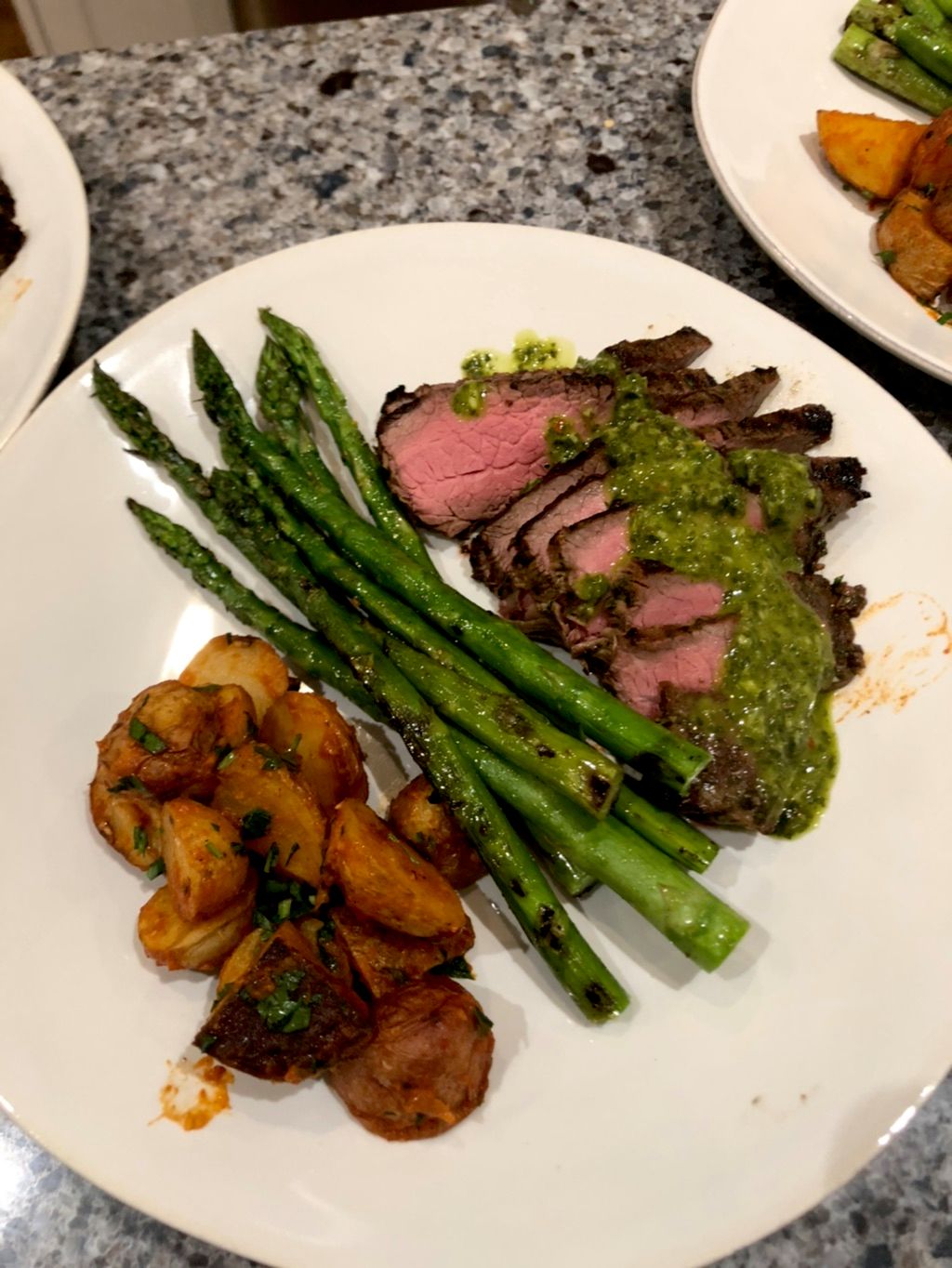 Grilled flank steak with chimichurri, patatas brav