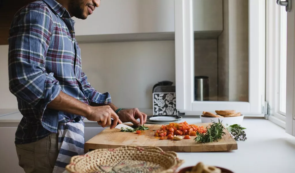 man cooking dinner