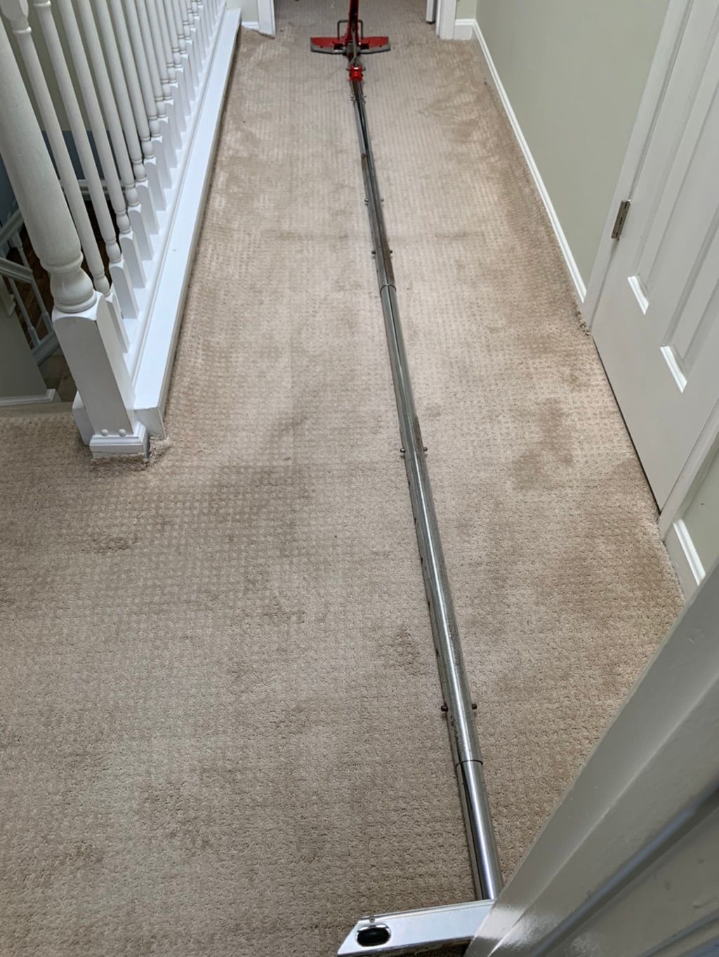 Carpet Wrinkle Removal( During- using the power st