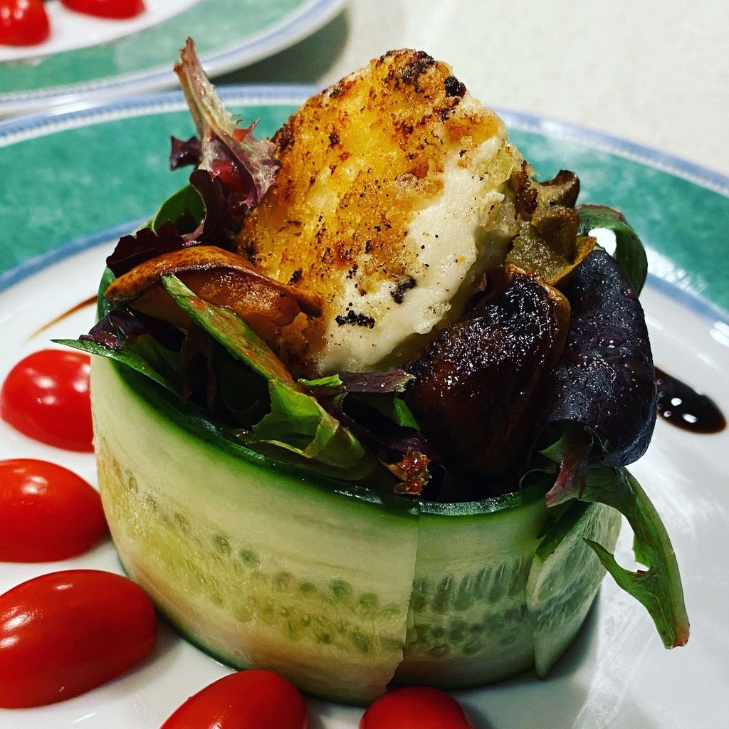Mixed baby greens , roasted portobellos and goat c