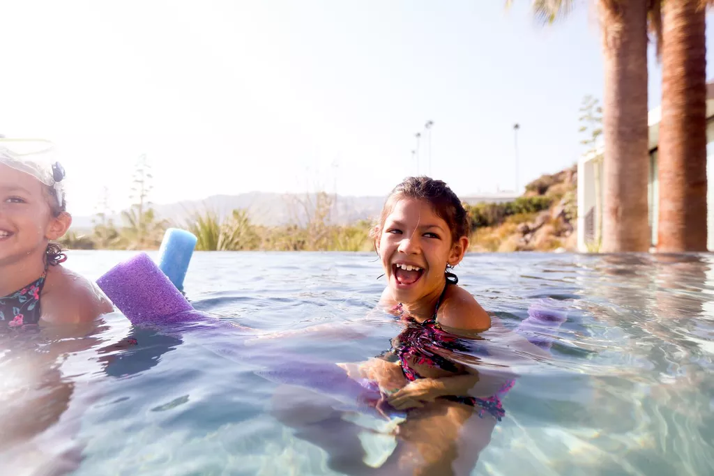 child in swimming pool