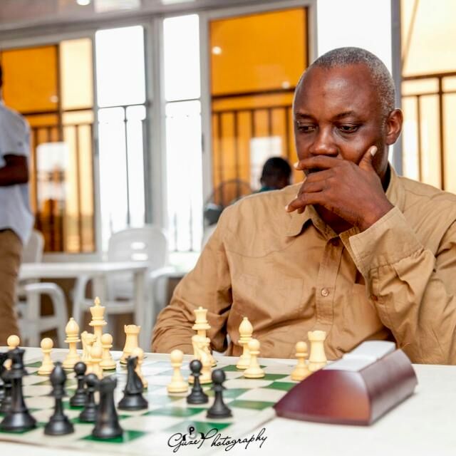 Deep in thought during a chess tournament.