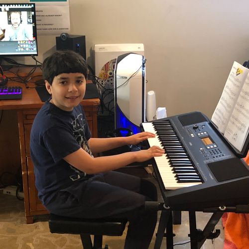 Zephyros has been learning piano from Russ for alm