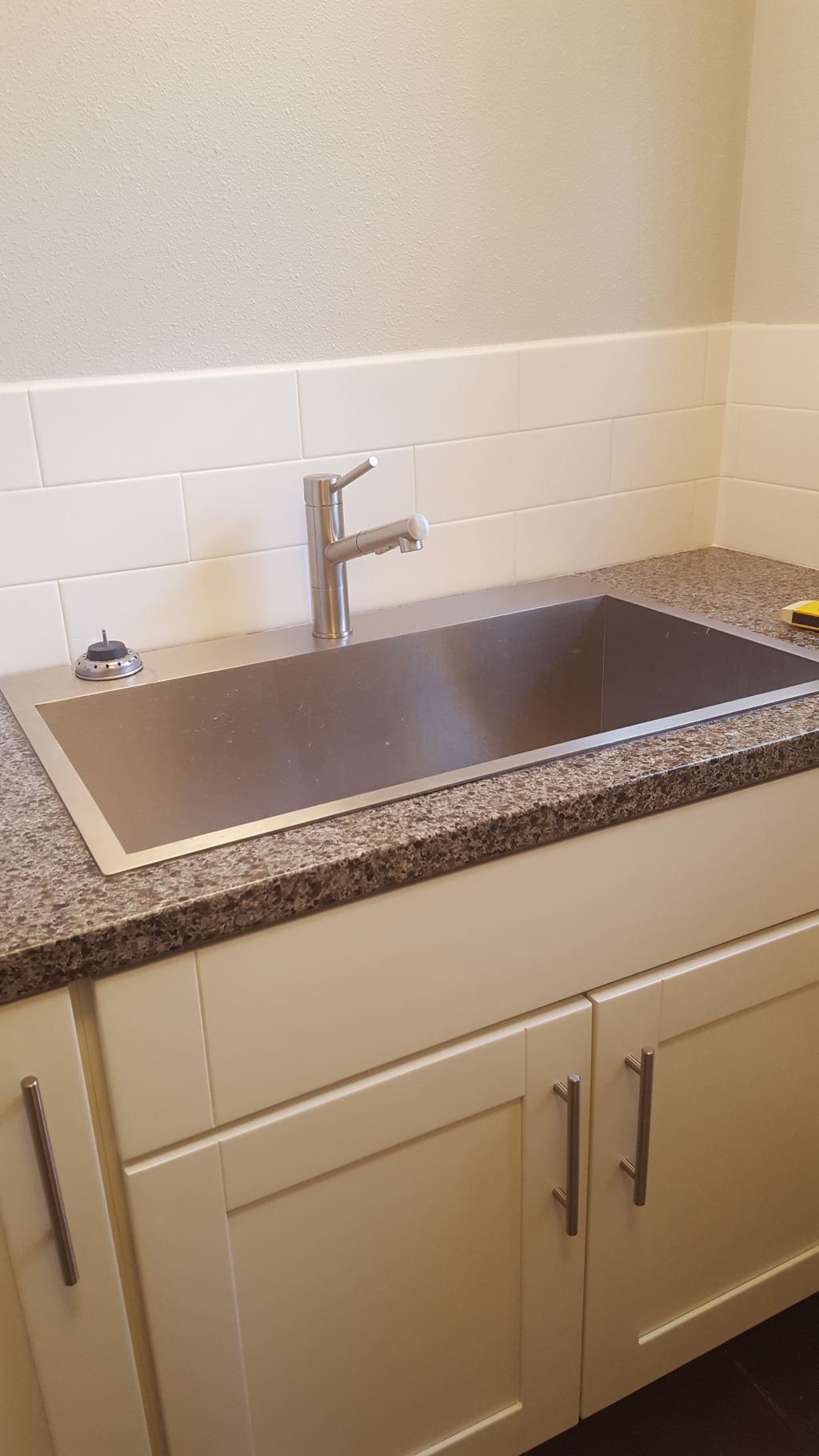 new counter, sink faucet and backsplash