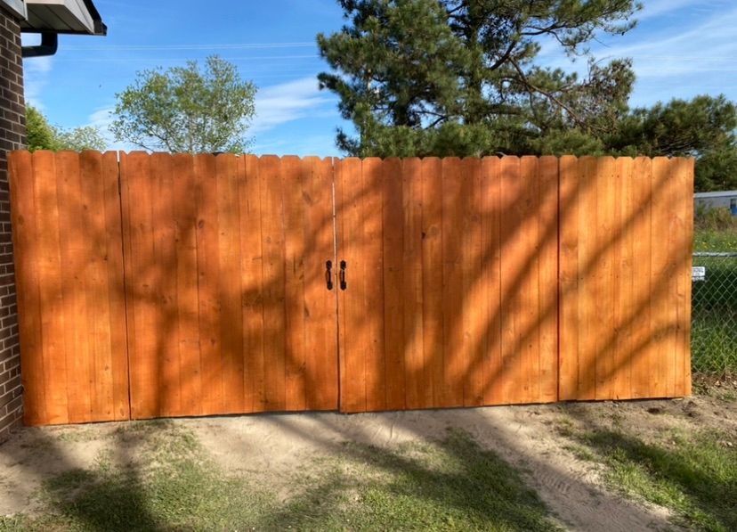 Built privacy fence and stained 