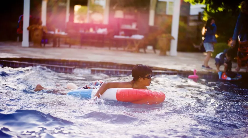 kids swimming in pool