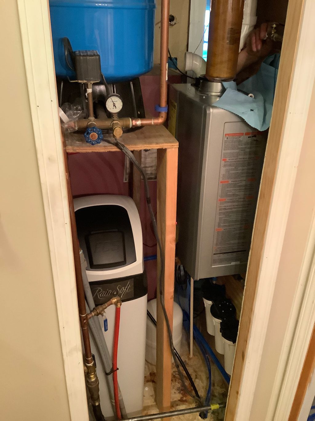 Water treatment and Rinnai in a tight space!
