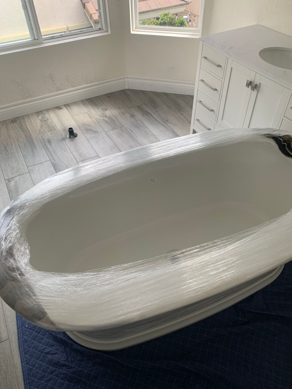 Tub from garage to second floor over 300lbs