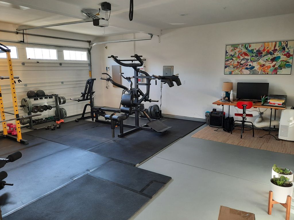 A private studio with a full range of exercise equ
