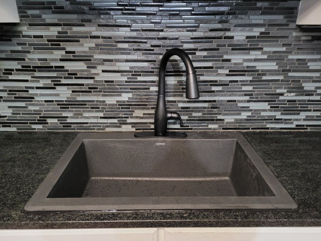 Great job replacing kitchen sink and faucet