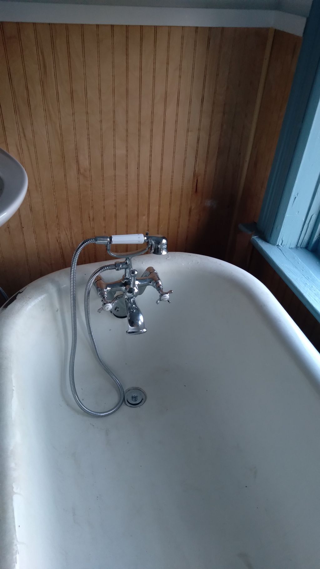 New fixtures on old clawfoot tub.