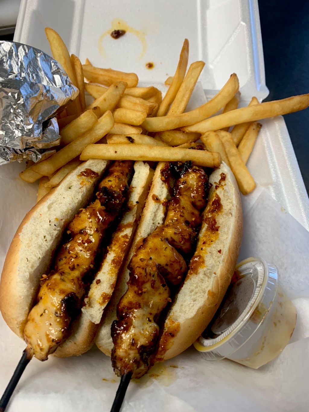 Grilled chicken skewers tossed in our special sauc