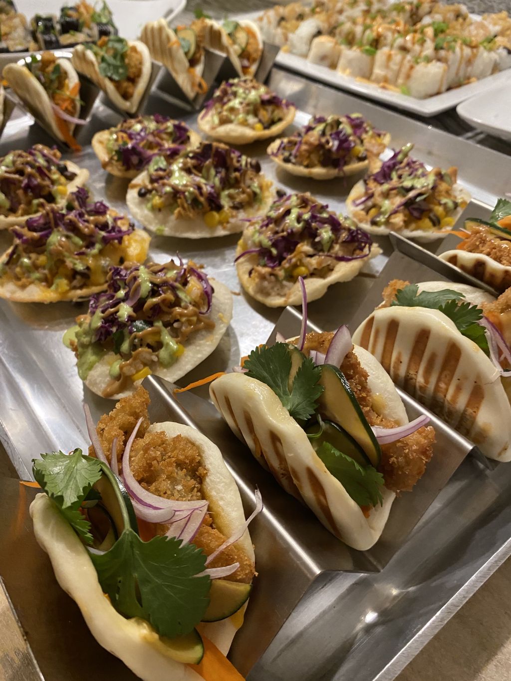 Asian nachos and pressed steamed buns 