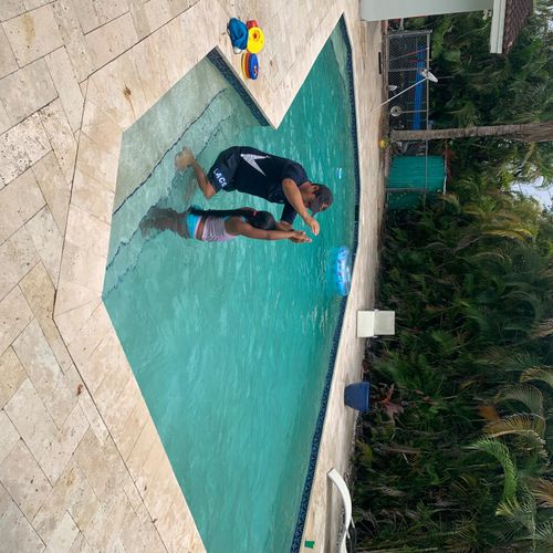Coach Tony taught my daughter how to swim under wa