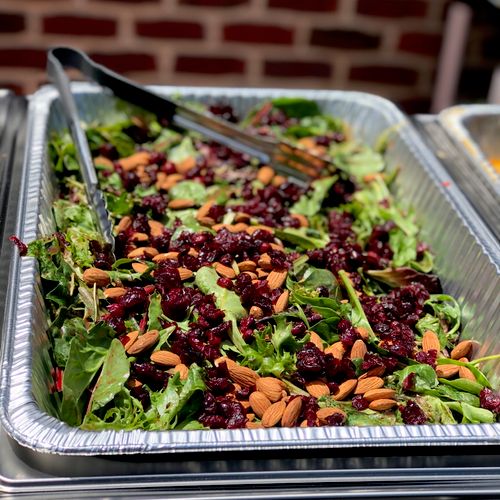 Event sampler: spring mix salad topped w/ organic 