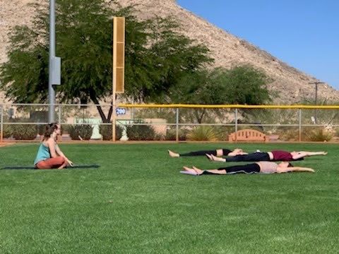 Outdoor small-group yoga class