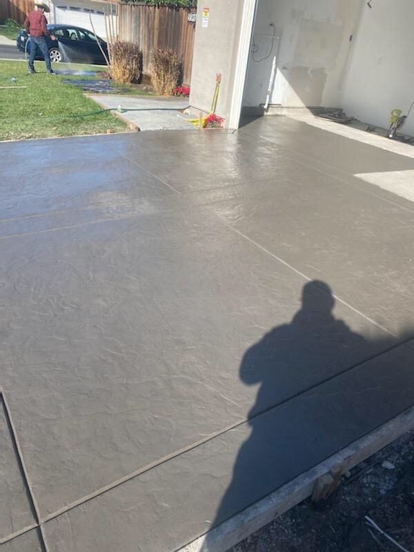 Stamped concrete and re pour 1/4 of garage 