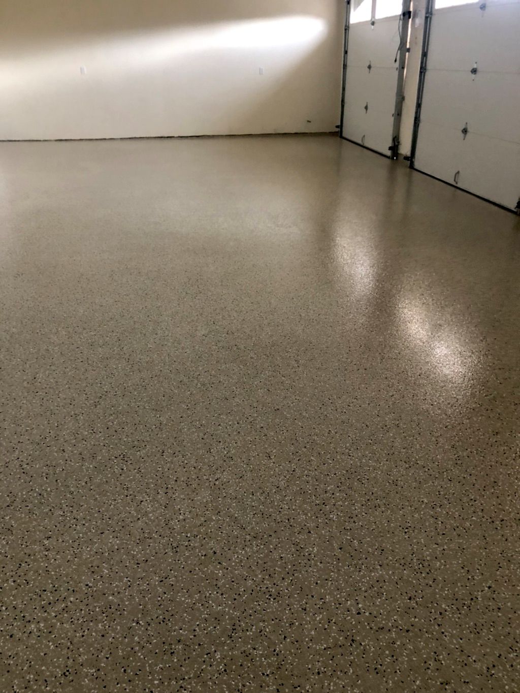 1,500 sq ft garage/6 car… overlayment with an epox