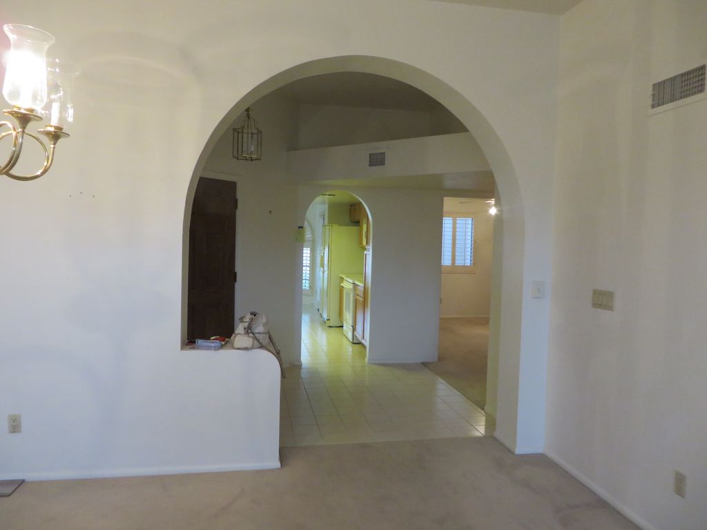 PV Condo LR to Kitchen Before