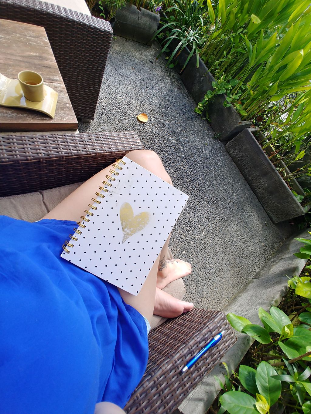 Journaling in Bali after completing a morning roof