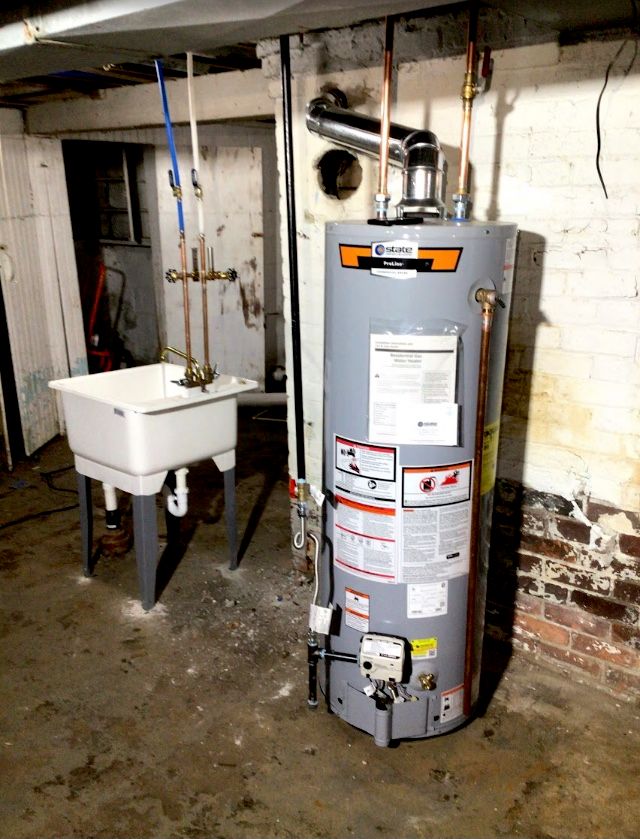 water tank and laundry sink w/faucet