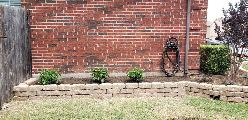 Planter built to extend to the side of the house