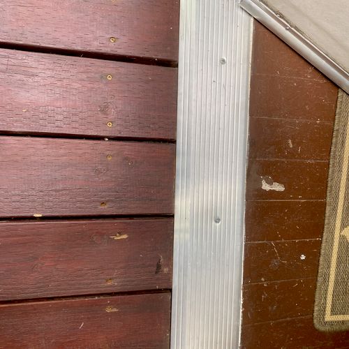Jose rebuilt a threshold for our side door. It was