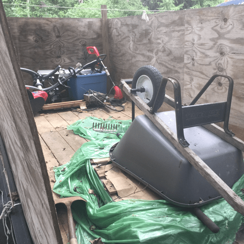 Trailer and tools used to remove junk