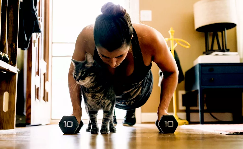 woman doing pushups at home