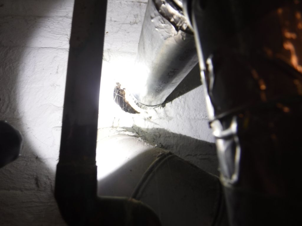 Water heater vent pipe installed wrong