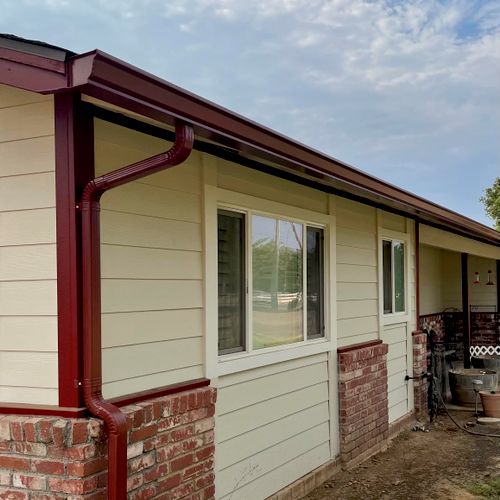 New 6" K-Style Seamless Gutters and downspouts.