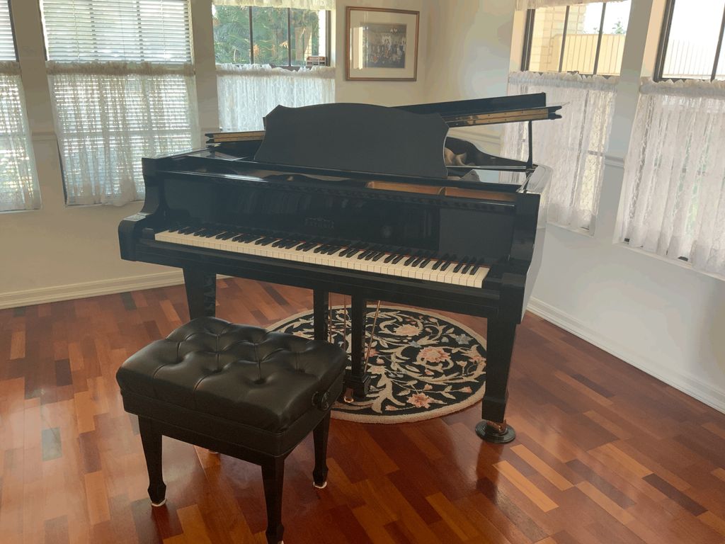 I teach from my piano room and use slides from the