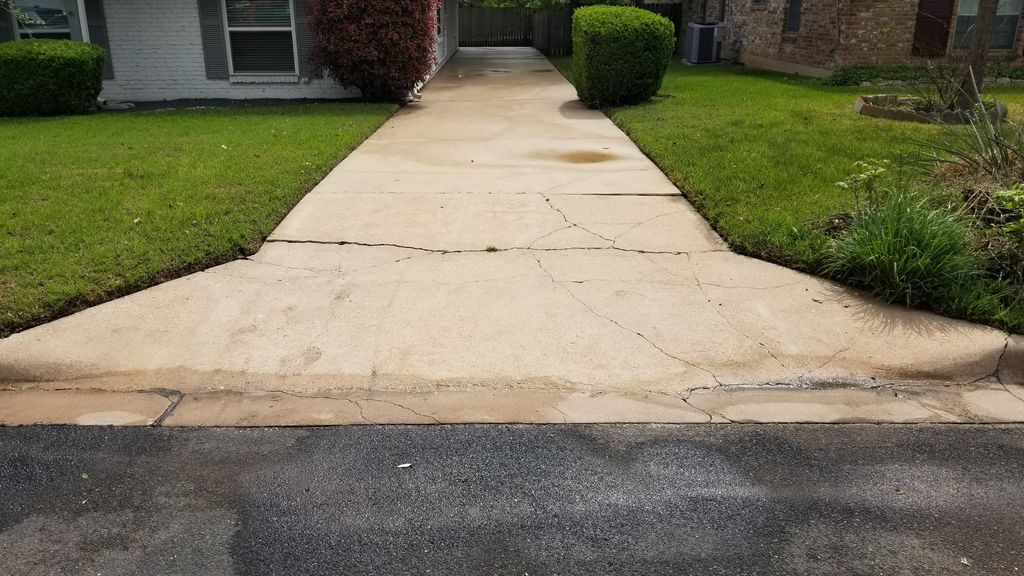 after photo 1s. pressure washing driveway