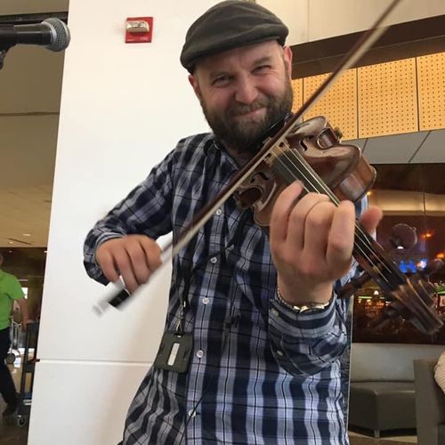 Performing a solo gig at SeaTac 