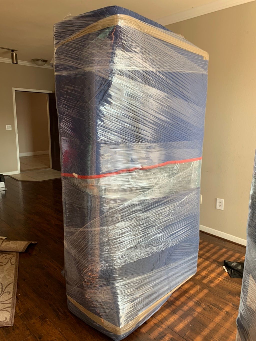 Better safe than sorry. A tall wooden book case wr