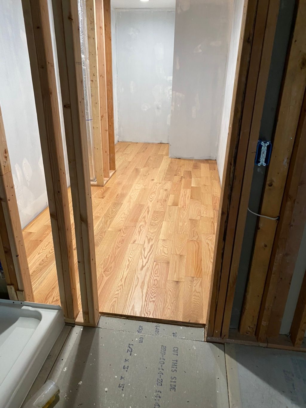 New beautiful hardwood floor in W/I closet!