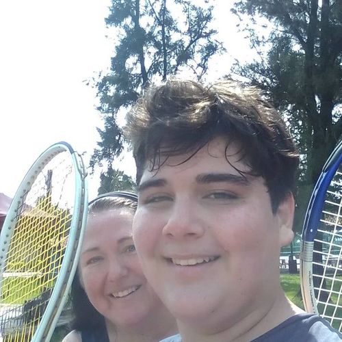 Playing tennis with my son