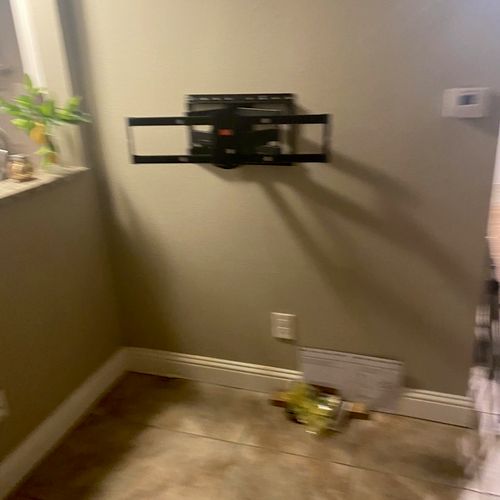 He installed a tv mount and shelves and did a grea