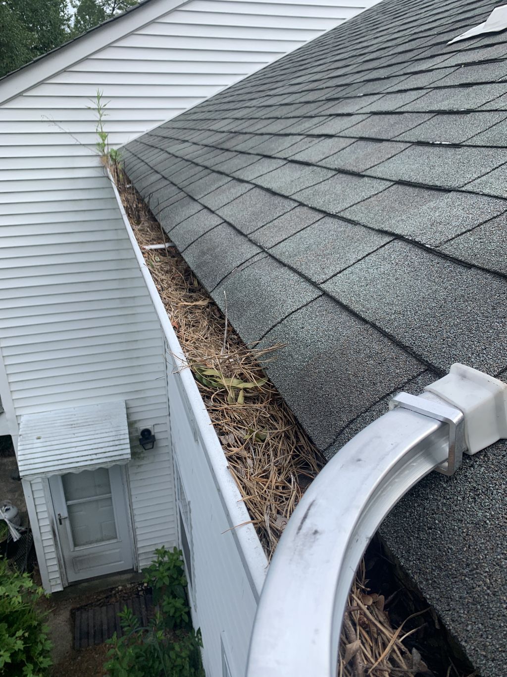 Before shot of gutters we were hired to clean