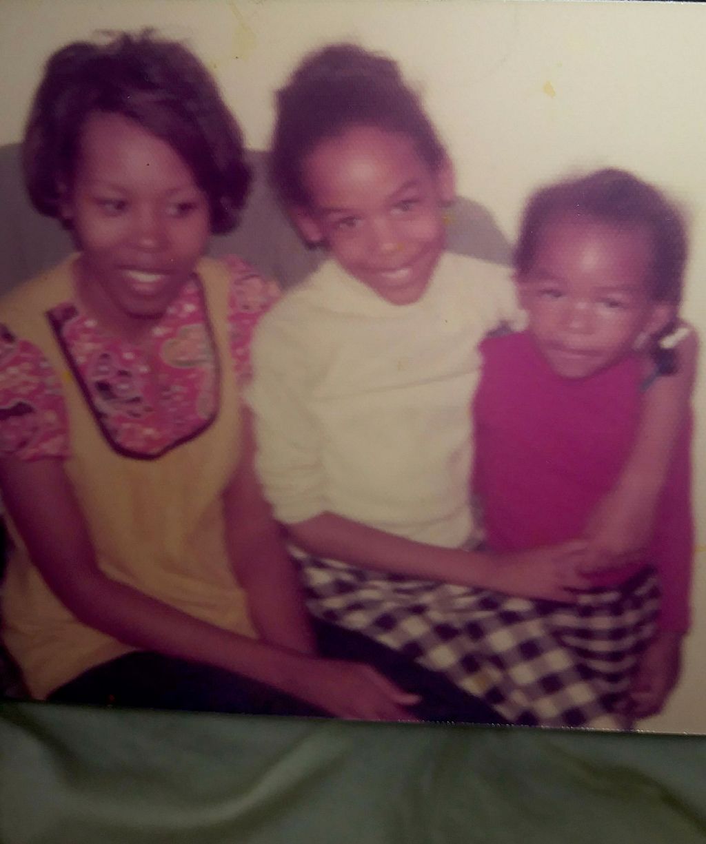 Me - in the middle. Mom on the left who nurtured m