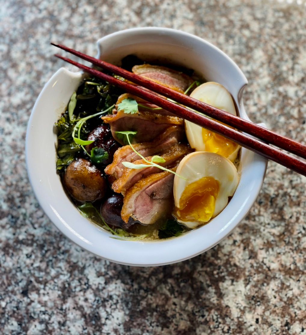 Duck ramen with collard greens and mushrooms