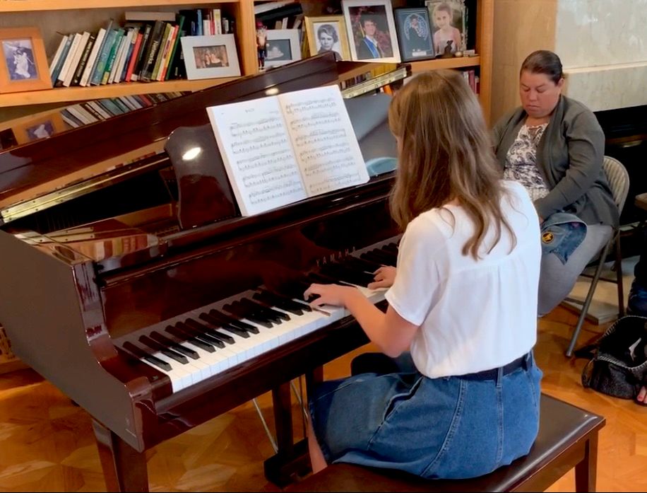 My daughter playing on a recital.