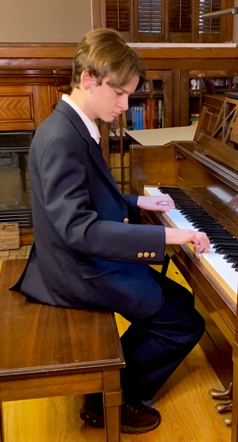 My son recording a piece for competition.