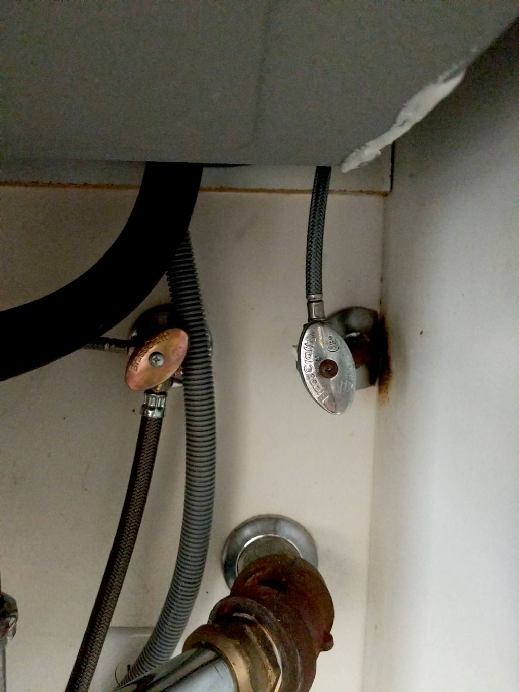 Sholom replaced a leaking shut off valve under the