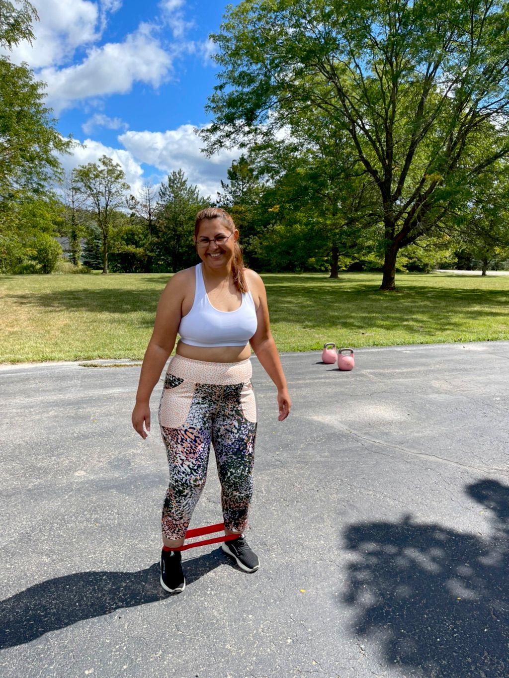 My client working out outside in my driveway, summ