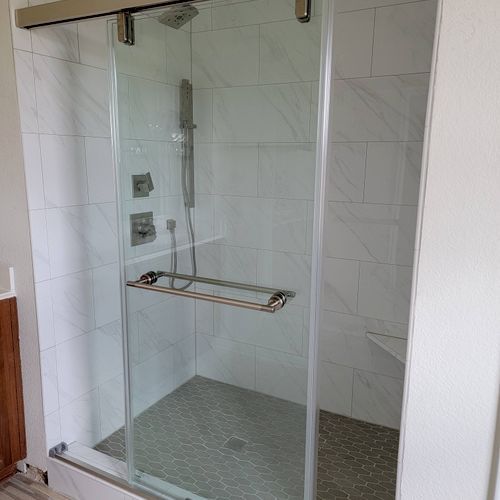 Logan and Scott installed our shower door and it l