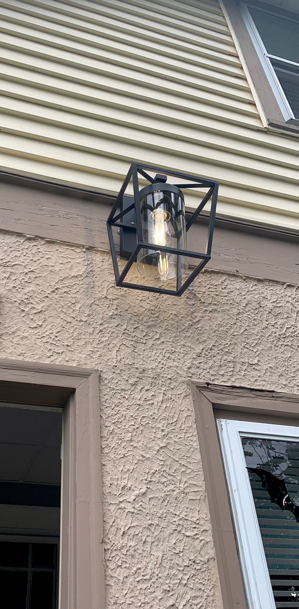 Hassan installed an outdoor light for our front do