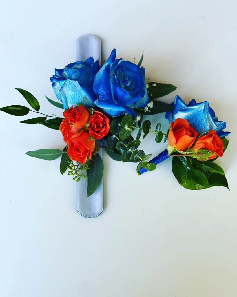 Blue and orange corsage and Boutonnière 
