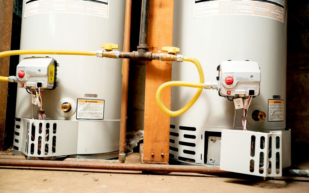 How much does it cost to install or replace a hot water heater?
